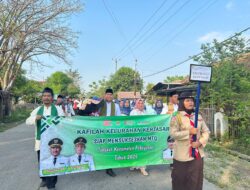 Lurah Kertasari Memimpin Pawai Ta’aruf MTQ ke VII Tingkat Kecamatan Pebayuran